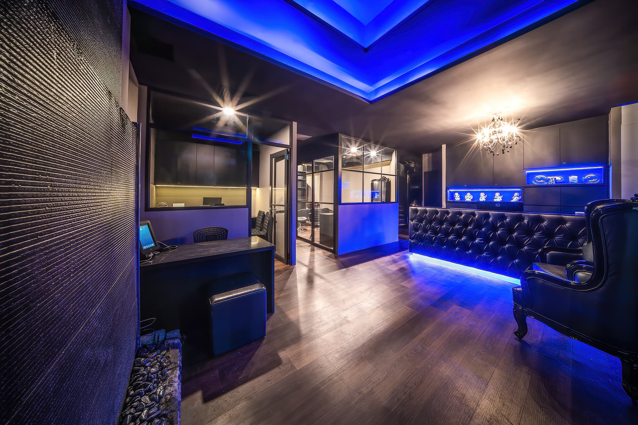 Modern beauty salon facility showcasing professional treatment areas with premium equipment and elegant design